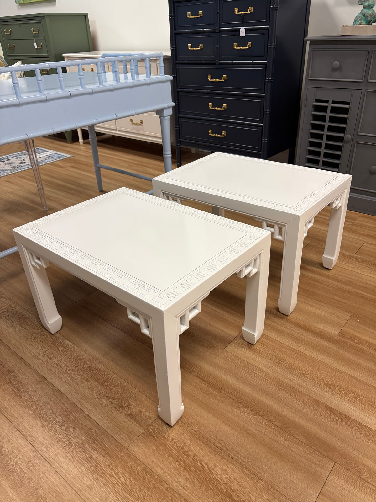 Side table with chinese details and fret work lacquered white