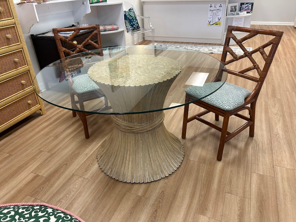 Round glass top table with cork-inspired base